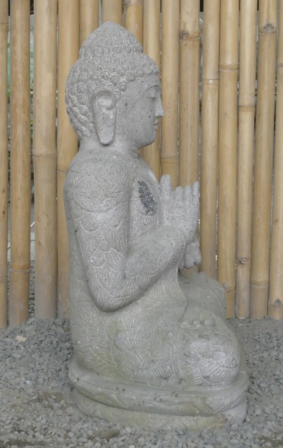  Product image 4 of the product “Seated Buddha with floral carving, Dharmacakra position. 67 cm height. Natural stone (river stone), stonemasonry. There is a stone eye in the chest. ”